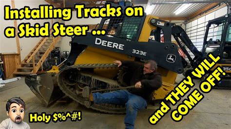 how to put track back on mini skid steer|john deere skid steer tracking.